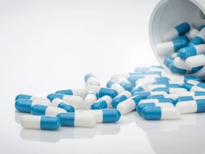 bluewhite-antibiotic-capsule-pills-spread-600nw-2317028543